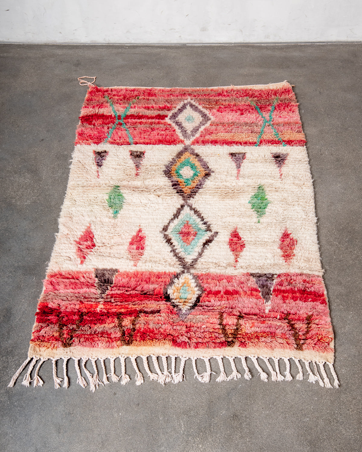 Modern, designer, handcrafted Berber rug from Morocco. Vintage carpet with beautiful colours and patterns and fluffy texture.